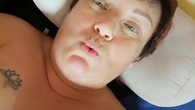 Fat woman shows her curves on camera