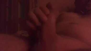 jerking off and cumming in bed with his cock